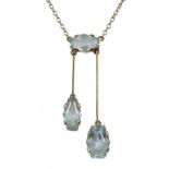 A BELLE EPOQUE BLUE TOPAZ AND GOLD NEGLIGEE PENDANT on integral necklet, pendant 4cm, marked 9ct,