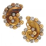 A PAIR OF DIAMOND SHELL SHAPED EARRINGS, MID 20TH C in two colour gold with round brilliant cut