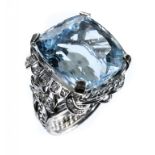 AN AQUAMARINE AND DIAMOND RING with cushion shaped aquamarine of approx 18 x 19mm and wirework
