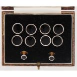 A 9CT TWO COLOUR GOLD AND BLACK ONYX DRESS SET cufflinks/buttons 1.2cm diam, by Deakin & Francis