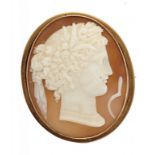 A CAMEO BROOCH, 19TH C the oval shell carved with the head and emblem of Ceres, mounted in gold,