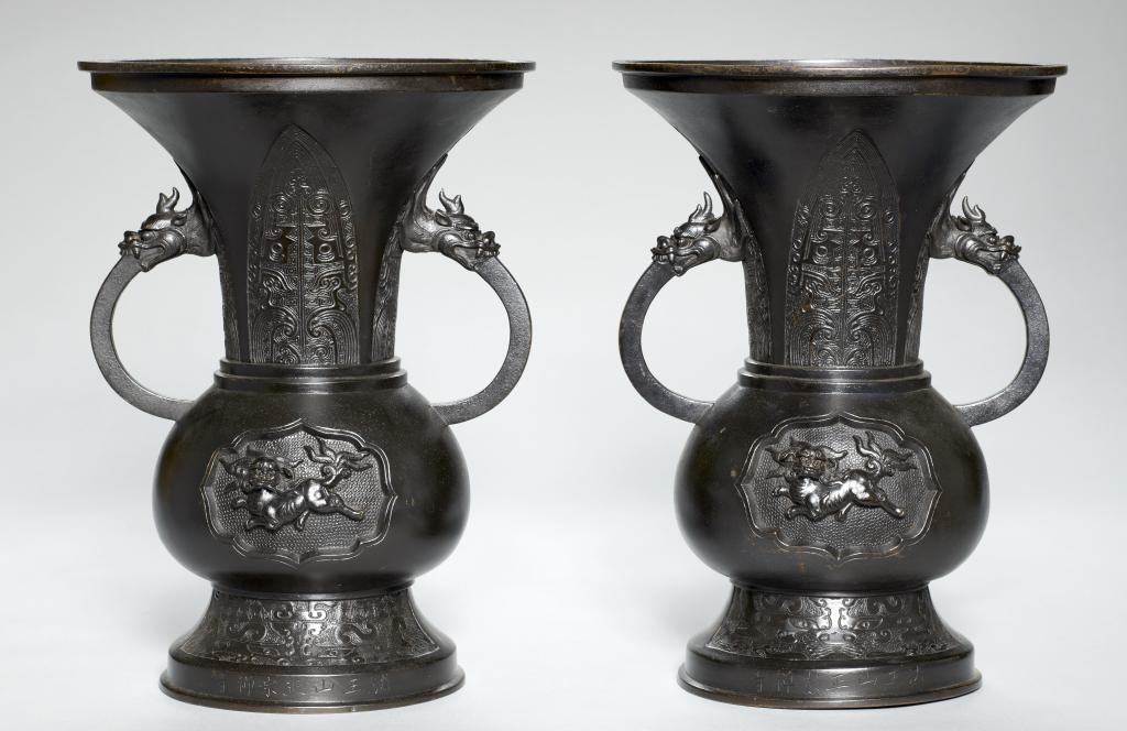 A PAIR OF JAPANESE BRONZE VASES, MEIJI PERIOD rich dark brown patina, 36.5cm h++Rim and foot of