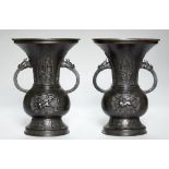 A PAIR OF JAPANESE BRONZE VASES, MEIJI PERIOD rich dark brown patina, 36.5cm h++Rim and foot of