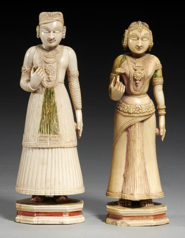 TWO SOUTH INDIAN POLYCHROME IVORY FIGURES OF A MAN AND WOMAN, 19TH C on octagonal base, 17 & 18cm