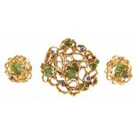 A 'UNCUT' EMERALD AND SAPPHIRE MODERNIST DEMI-PARURE in 18ct gold and of openwork abstract form