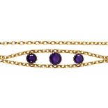 AN AMETHYST NECKLACE the gold chain with three round amethysts and demountable for wear as a
