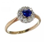 A SAPPHIRE AND DIAMOND CLUSTER RING, EARLY 20TH C with old cut diamonds in gold, marked 18ct, 2.