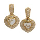 A PAIR OF DIAMOND EARRINGS of heart shape, containing loose diamonds, with round brilliant and