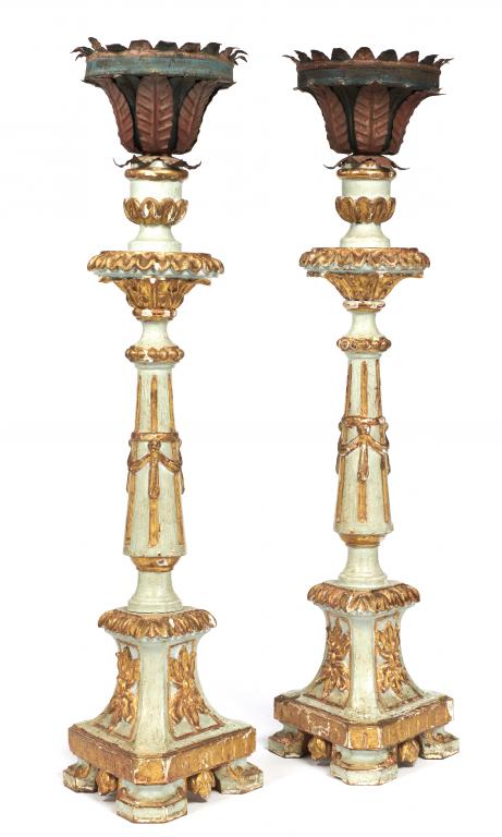 A PAIR OF CONTINENTAL CARVED, GILT AND PAINTED WOOD CANDLESTICKS WITH BLUE AND RED PAINTED SHEET