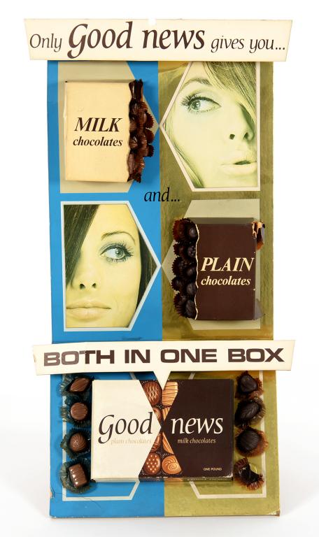 VINTAGE POINT OF SALE ADVERTISING. A SHOWCARD FOR "GOOD NEWS PLAIN AND MILK CHOCOLATES"