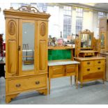 A STAINED BEECH THREE PIECE BEDROOM SUITE IN ARTS AND CRAFTS STYLE, COMPRISING WARDROBE, 210CM H,