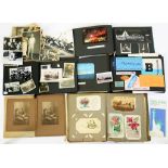 A HOLIDAY ALBUM OF SNAPSHOT PHOTOGRAPHS, PRINTED EPHEMERA, MENUS AND TICKETS OF A TRIP TO PARIS BY