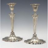 A PAIR OF VICTORIAN SILVER FLUTED OVAL CANDLESTICKS, 28CM H, SHEFFIELD 1899, LOADD++SLIGHTLY