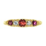 A GARNET AND OLD CUT DIAMOND RING, LATE 19TH C, IN GOLD, 2G, SIZE H++LIGHT WEAR CONSISTENT WITH AGE,