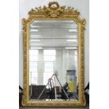 A VICTORIAN GILTWOOD AND COMPOSITION MIRROR WITH BEVELLED PLATE, 172 X 104CM