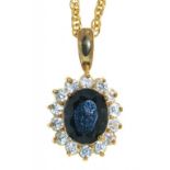 A GEM SET PENDANT IN GOLD, UNMARKED ON GOLD CHAIN MARKED 14K, 6G++LIGHT WEAR CONSISTENT WITH AGE