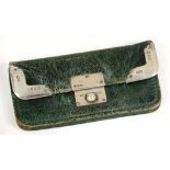 A VICTORIAN SILVER MOUNTED GREEN MOROCCO PURSE, 10.5 CM W, BIRMINGHAM 1876++LEATHER WORN