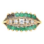 AN EMERALD AND DIAMOND RING, IN 9CT GOLD, BIRMINGHAM 1987, 3G, SIZE Q++2 EMERALDS DEFICIENT, LIGHT
