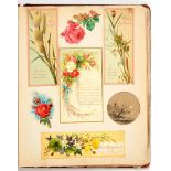 A VICTORIAN ALBUM OF GREETINGS CARDS including many paper lace and other Valentine cards the