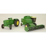 A DIE-CAST MODEL JOHN DEER TRACTOR AND HARVESTER