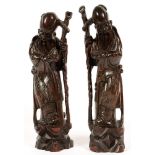 A PAIR OF CHINESE CARVED AND WIRE INLAID HARDWOOD FIGURES OF SHOU LAO, 37CM H, C1900