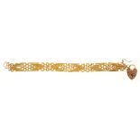 A 9CT GOLD GATE BRACELET, 22G++IN GOOD CONDITION, WITH LIGHT WEAR CONSISTENT WITH AGE