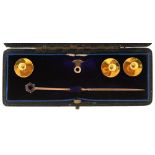 THREE 18CT GOLD DRESS STUDS, A FURTHER GOLD DRESS STUD AND A GARNET STICK PIN IN GOLD, CASED, 5.