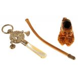 A SILVER BABY'S RATTLE, BIRMINGHAM 1921, AND A MEERSCHAUM PIPE++MEERSCHAUM PIPE DAMAGED, RATTLE