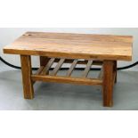 A HARDWOOD COFFEE TABLE WITH RACK UNDERTIER, 54 X 101CM