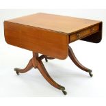 A GEORGE IV MAHOGANY AND CROSSBANDED DROP LEAF TABLE ON HOLLOWED TRESTLES WITH ARCHED STRETCHER,