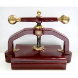 BOOKBINDING. A VICTORIAN BRASS MOUNTED CAST IRON BOOK PRESS BY JOHN L. YOUNG NOTTINGHAM, 50CM L,