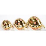 A ROYAL CROWN DERBY YORKSHIRE ROSE PATTERN TORTOISE FAMILY, COMPRISING FATHER, MOTHER AND BABY,