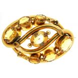 A LATE 19TH C CITRINE BROOCH, IN GILT BRASS, APPROX 6 X 4 CM++LIGHT WEAR AND SCRATCHES CONSISTENT