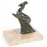 AN ART DECO BRONZED SPELTER AND MARBLE ASHTRAY IN THE FORM OF A LEAPING DEER, 17CM H, C1935
