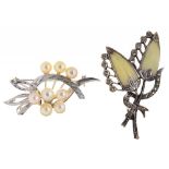 A CULTURED PEARL AND SILVER BROOCH AND A MARCASITE AND SHELL BROOCH++TARNISH AND WEAR CONSISTENT