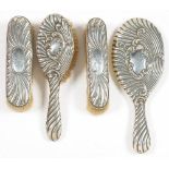 A VICTORIAN FOUR PIECE SILVER DRESSING SET, CHESTER 1895 (4)