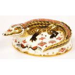 A ROYAL CROWN DERBY CROCODILE PAPERWEIGHT, 15CM L, PRINTED MARK, GILT STOPPER