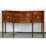 A SERPENTINE MAHOGANY AND EBONY LINE INLAID SIDEBOARD, 153CM L, EARLY 20TH C