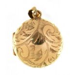 A 9CT GOLD CHASED LOCKET ON GOLD CHAIN, 20.5G