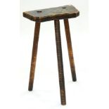 A 19TH C STAINED ASH 'CUTLERS' STOOL ON TURNED LEGS, 39CM L