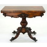 A VICTORIAN ROSEWOOD TEA TABLE, THE LOBED BALUSTER PILLAR ON QUADRUPLE SCROLLING LEGS, 92CM L