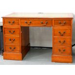 A YEW WOOD DESK WITH TOOLED LEATHER INLET TOP, 121CM L