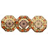 THREE ROYAL CROWN DERBY OLD IMARI PATTERN OCTAGONAL PLATES, 23.5CM D, PRINTED MARKS