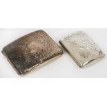 TWO GEORGE V SILVER CIGARETTE CASES, 8.5 X 6 AND 10 X 8 CM, CHESTER 1919 AND SHEFFIELD 1923, 6OZS