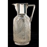 A LATE VICTORIAN EPNS MOUNTED GLASS CLARET JUG BY HUKIN AND HEATH, THE BODY CUT AND ENGRAVED WITH