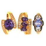 THREE AMETHYST SET RINGS, ONE IN 9CT GOLD, THE OTHERS GOLD PLATED, SIZES M - O ++IN GOOD CONDITION