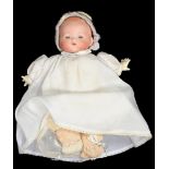 AN ARMAND BISQUE HEADED DREAM BABY DOLL, PADDED BODY, 25CM H, HEAD EARLY 20TH C