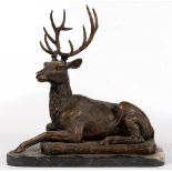 A BRONZE SCULPTURE OF A STAG AT LODGE, ON MARBLE BASE, 37CM H
