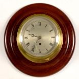 A BRASS SHIP'S TIMEPIECE WITH SILVERED DIAL AND BLUED STEEL HANDS, ON LATER TURNED MAHOGANY MOUNT,