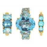 THREE GEM SET RINGS, COMPRISING A TOPAZ RING IN SILVER, A TOPAZ RING IN 9CT GOLD AND A BLUE ZIRCON